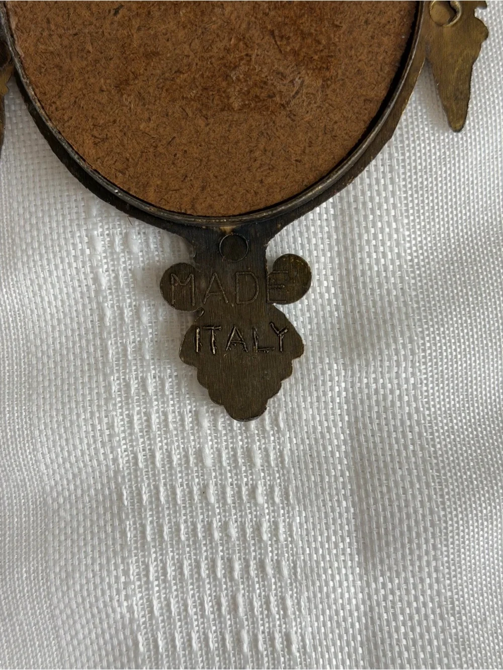 Vintage Made in Italy as stated on the back.  Ornate Wall Mirror
